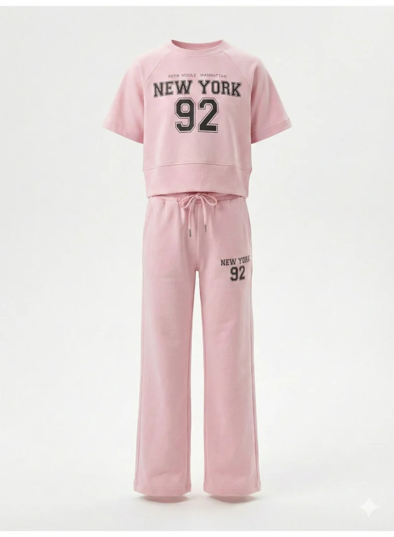 فكتور اند جين طقم بناتي قطعتين بطبعة نيويورك بلوزة وبنطلون - وردي فاتح